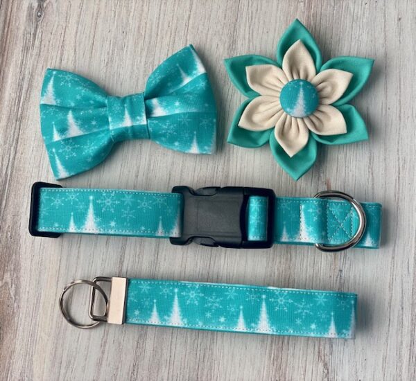 A dog collar and leash set with bows, flowers, and trees.